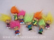 Eight Burger King Glow in the Dark Trolls, two sets of four, 13 oz
