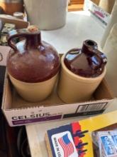 2 smaller crock jugs....Shipping