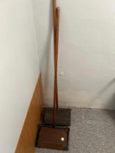 2 Vintage floor sweepers.