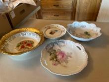 Painted plates, clear glass bowl.