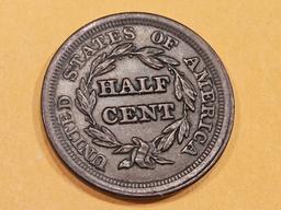 1853 Braided Hair Half-Cent in Choice About Uncirculated plus