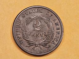 1864 Two Cent piece in About Uncirculated Plus