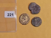 Three Ancient-y looking coins