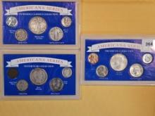 Three silver Americana coin sets
