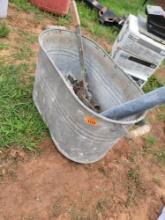 galvanized bucket with wood handles with misc tool inside