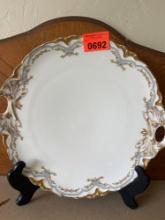 Haviland handed plate with stand.