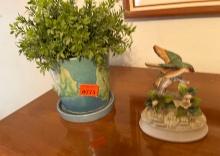Pot with artificial plant in porcelain use box, bird, and flowers, and leaves from the gift world of