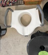 Toilet seat topper for people that have trouble getting up and plastic black seat