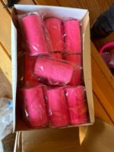 Box full of pink vet wrap.