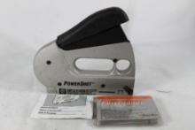 PowerShot hand stapler and a partial box of staples. Used.