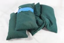 Four sand filled nylon shooting bag rests. Used, in good condition.