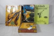 One book on antique firearms, one Glock takedown guide, one On Target magazine, one on gas pellet