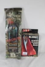 Mad Dog fowl weather dry bag and one all season, all reason outdoor blanket. In packages.