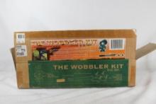 The Wobbler Kit for clay bird trap thrower. In box.