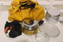 Large yellow nylon bag with miscellaneous camping cooking pots and pans, etc. Used.