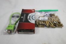 One box of 45 ACP fired brass, one bag of fired 300 Blackout brass and one cable gun lock.