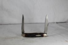 Ka-bar model 1063 large Stockman with 3.0 inch main blade. Jigged Delrin scales. Good condition.
