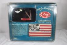 Case Red Bone Mini-Trapper with 2.75 inch blades in plastic display case. Comes in collector tin.