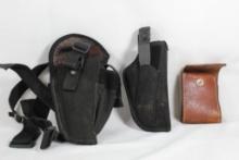 Two nylon right handed holsters and one leather folding ammo pouch. Used.