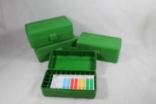 Four green MTM 50 round ammo boxes for small rifle cartridges. Like new.
