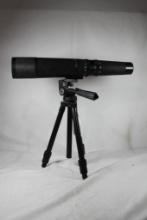 Tasco World Class 20x- 60x zoom telescope with adjustable tripod. In good condition.