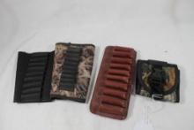 Two belt ammo carriers and two rifle butt stock ammo carriers. Used.