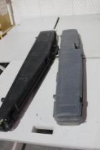Two plastic rifle cases. Used.
