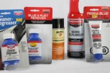 Bag of gun cleaning products and cold bluing products. In packages.