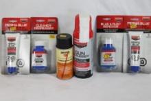 Bag of gun cleaning products and cold bluing products. In packages.