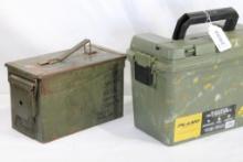 Two ammo boxes. One metal 30 cal and one green plastic with pull out tray.