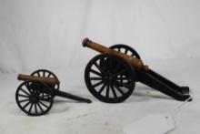 Two miniature cast iron cannons. Used, in good condition.