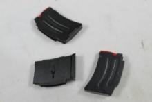 Two Savage MKII magazines and one single shot spacer. Look unused.