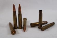 Six loaded rounds of 303 British and 33 fired casings