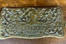 Barber Chair brass trademark plate