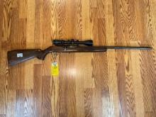 16)	Mossberg & Sons, 22 Magnum Bolt w/scope