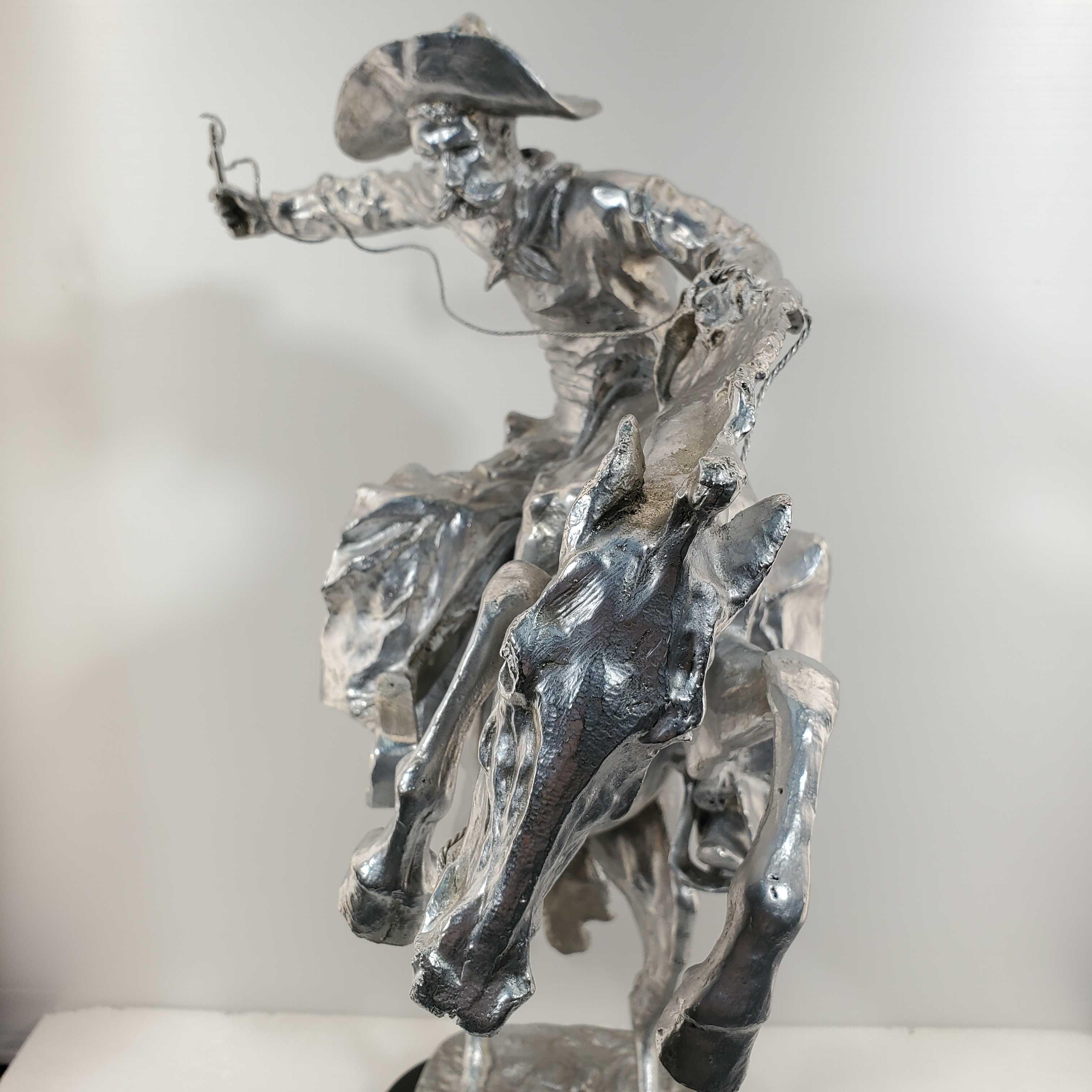 After Frederic Remington " Bronco Buster" Bronze With Silver Patina