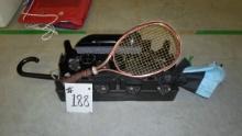 coke crate with content, tennis racket, car storage and umbrella