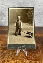 Boy with Toy Wagon Cabinet Photo