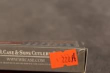 1989 RED JIG BONE SM. COKE BOTTLE CENTENIAL BLADE ETCH R6225 1/2 SS