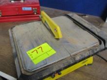 SMALL ELECTRIC TILE SAW-WORKS