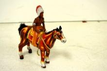 Tin wind-up Indian and horse