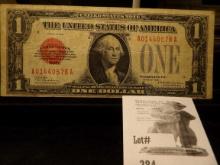 From our December 2014 Auction comes Series 1928 One Dollar Red Seal U.S. Note, Signed Woods & Woode