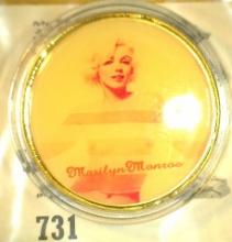 Marilyn Monroe Nude Gold-plated Medal, (see through top). Encapsulated.