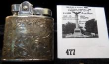 Prince Mfg. Co. highly engraved Silver Cigarette Lighter. "Aldena" engraved.