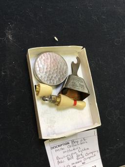box of miscellaneous collectibles, including bowling pin, lighter advertisement, bell for beer