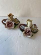 PAIR OF FLORAL CERAMIC CANDLEHOLDERS