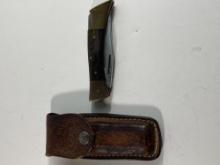 CASE "SHARK TOOTH" FOLDING KNIFE IN SHEATH