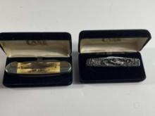 TWO CASE KNIVES IN VELVET BOXES