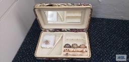 Small floral jewelry box with costume jewelry rings