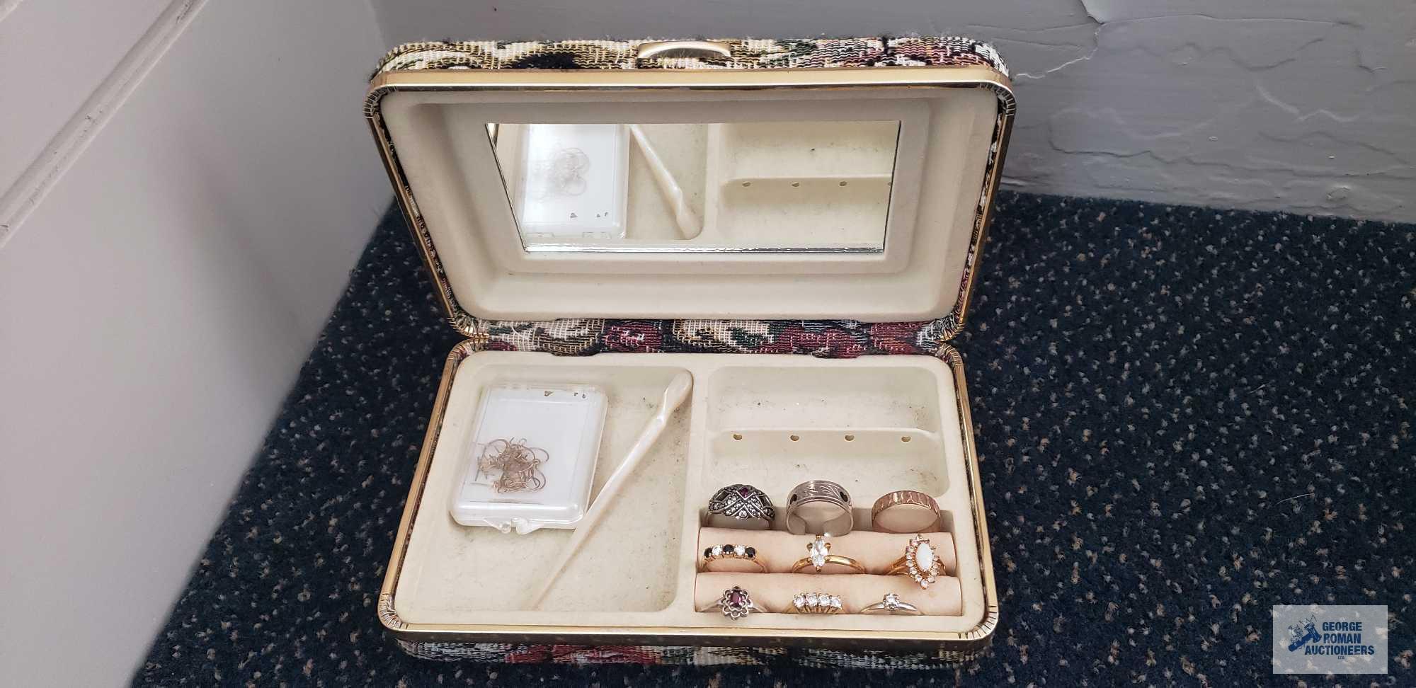 Small floral jewelry box with costume jewelry rings